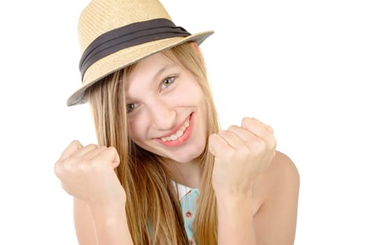 smiling teenager showing fists on white background