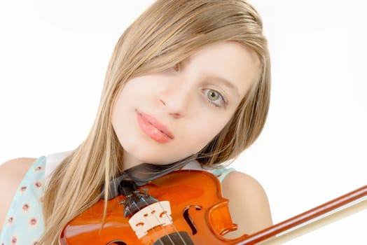 a teenage girl with long hair plays violin on the white background