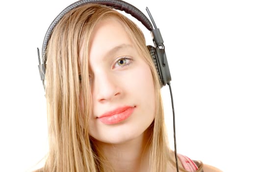 portrait of teenage girl with headphone on the white background