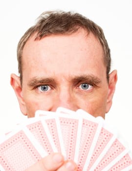 Man with fanned-out playing cards