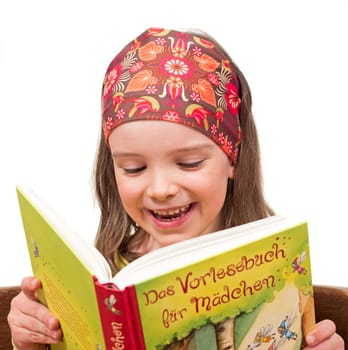 Child reads a book