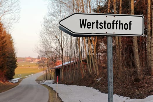 Street sign -Recyclable yard sign. A waste disposal point