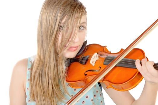 a teenage girl with long hair plays violin on the white background