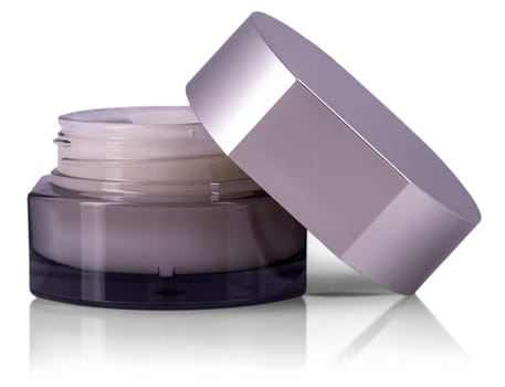 The cosmetic cream in container isolated on white background