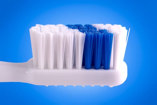 The new Toothbrush isolated on blue background