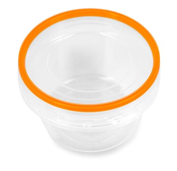 Transparent plastic food container with red cap. Catering food packaging.