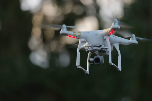 11 - Drone quad copter with stabilised camera used for photography. Professional applications in industrial inspection and surveillance also.