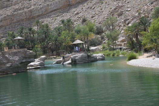 The famous Wadi Bani Khalid is located in the Shamal asch Sharqiyya district in the Hajar Mountains and near the Muqal Cave. The oasis is located in the Sultanate of Oman.