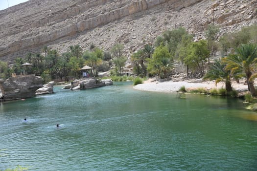 The famous Wadi Bani Khalid is located in the Shamal asch Sharqiyya district in the Hajar Mountains and near the Muqal Cave. The oasis is located in the Sultanate of Oman.