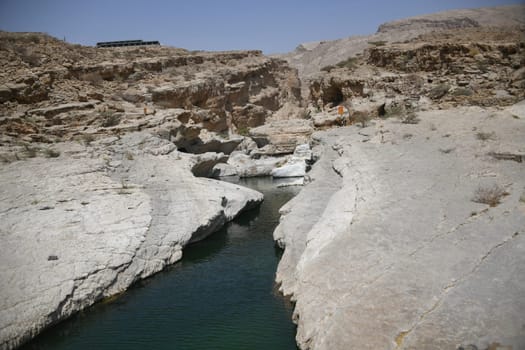 The famous Wadi Bani Khalid is located in the Shamal asch Sharqiyya district in the Hajar Mountains and near the Muqal Cave. The oasis is located in the Sultanate of Oman.