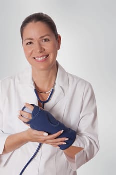 Female doctor wearing a wrist brace