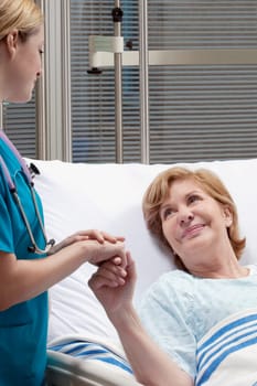 Female doctor discussing with a patient