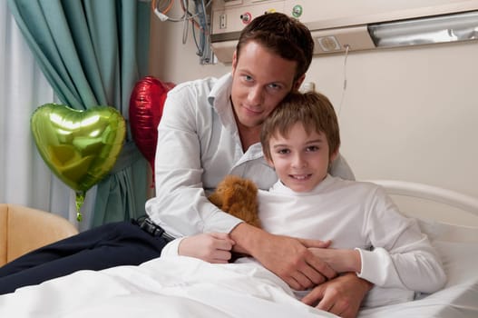 Father with his son in a hospital