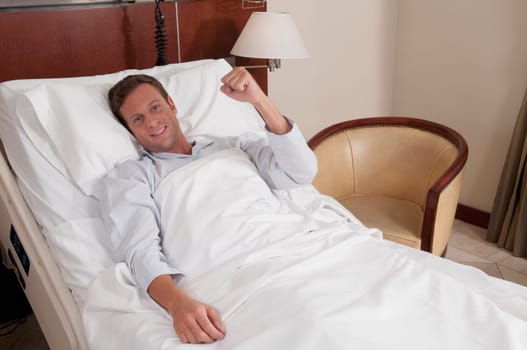 Man lying in a hospital bed