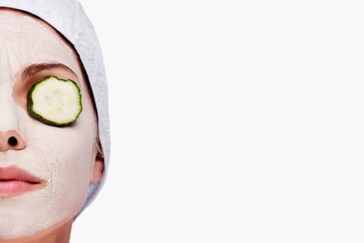Woman receiving facial treatment