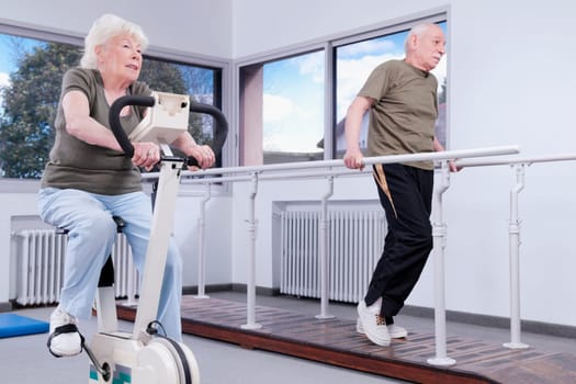 Couple exercising in a rehabilitation center