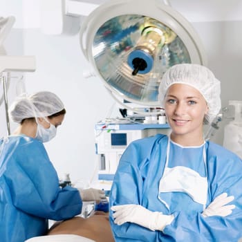 Female surgeon in an operating room