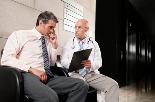 Doctors discussing a medical report