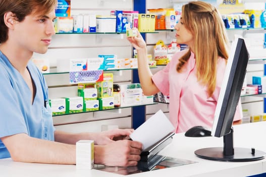 Two pharmacists in a pharmacy