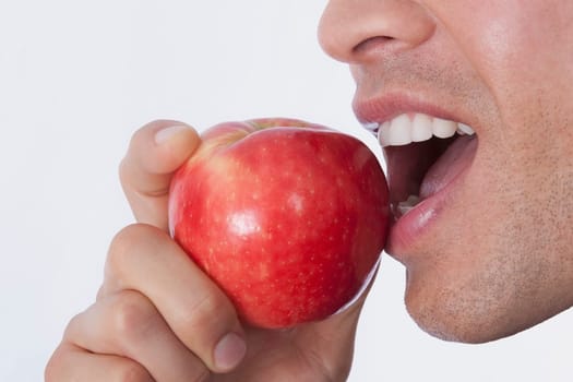 Man eating an apple