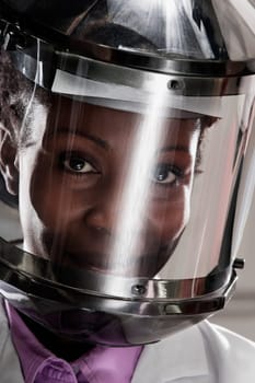 Female doctor wearing a protective gear in a laboratory