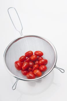 Close_up of tomatoes in a sieve