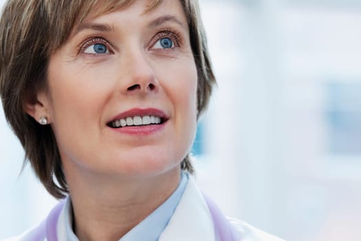 Close_up of a female doctor smiling
