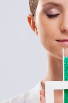 Woman smelling bath crystals