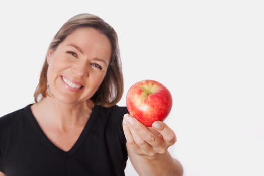 Woman holding an apple