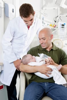 Man carrying his newborn baby