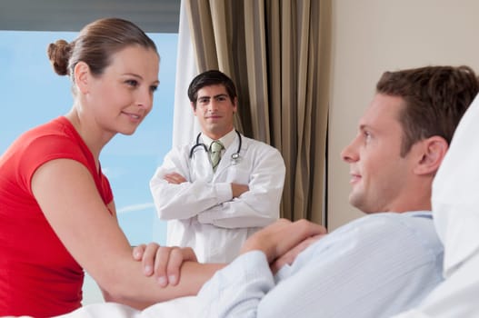 Woman in a hospital with her husband
