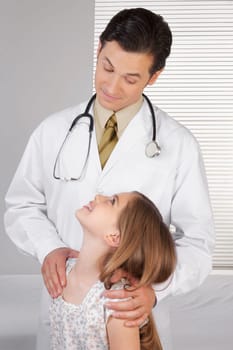 Doctor and a girl looking at each other