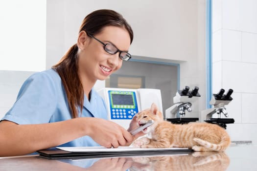 Female vet writing a prescription