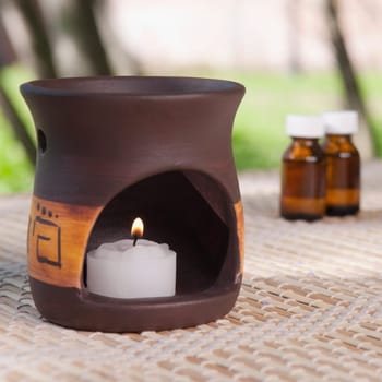 Aromatherapy burner with aromatherapy oil bottles
