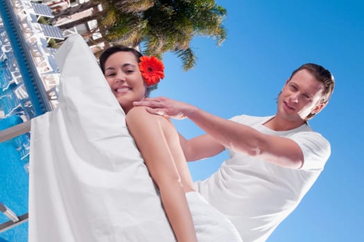 Woman receiving back massage from a massage therapist