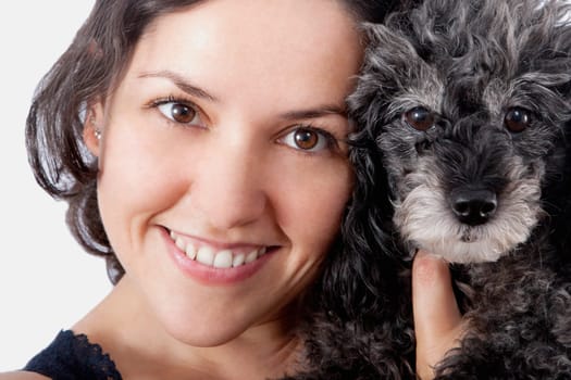 Portrait of a woman with a poodle