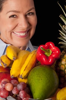 Woman with assorted fruits