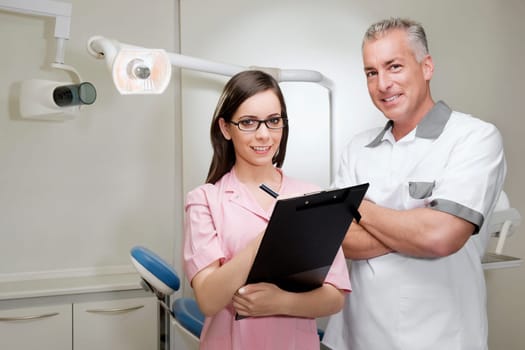 Portrait of two dentists smiling