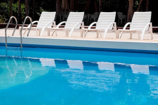 Lounge chairs at the poolside