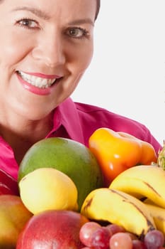 Woman with assorted fruits
