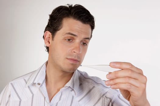 Man reading a thermometer