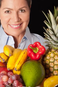 Woman with assorted fruits