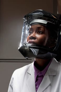 Female doctor wearing a protective gear in a laboratory