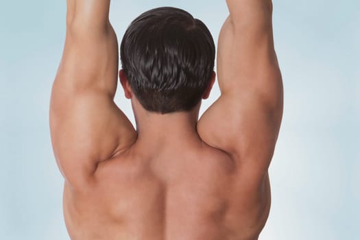 Rear view of a man exercising