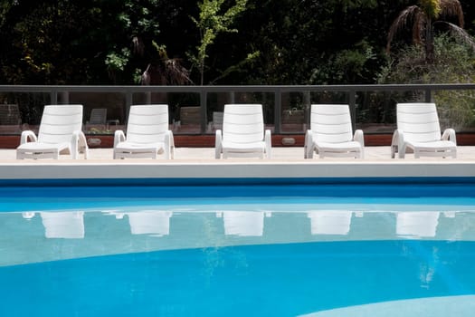 Lounge chairs at the poolside