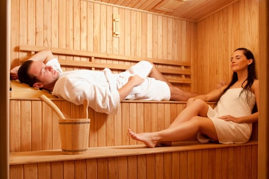 Couple taking a sauna bath