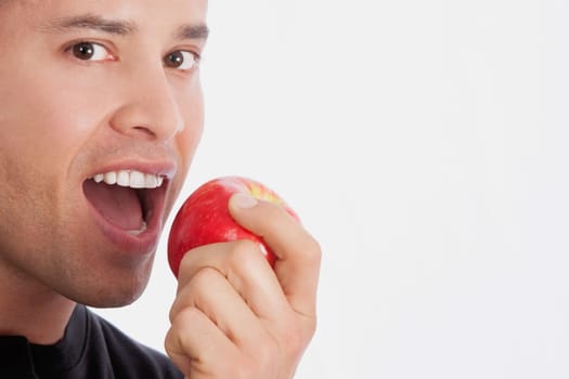 Man eating an apple