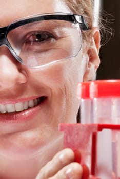 Female doctor holding medical samples in a laboratory