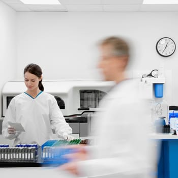 Female doctor examining a report in a laboratory