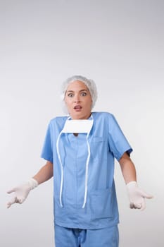 Portrait of a female surgeon gesturing